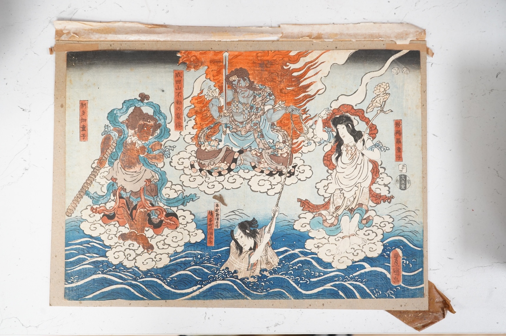 After Utagawa Kunisada (1786-1865), ‘Fudo Myoo, Kongara Doji and Seitaka Doji’, Japanese woodblock print, unframed, 25 x 36cm